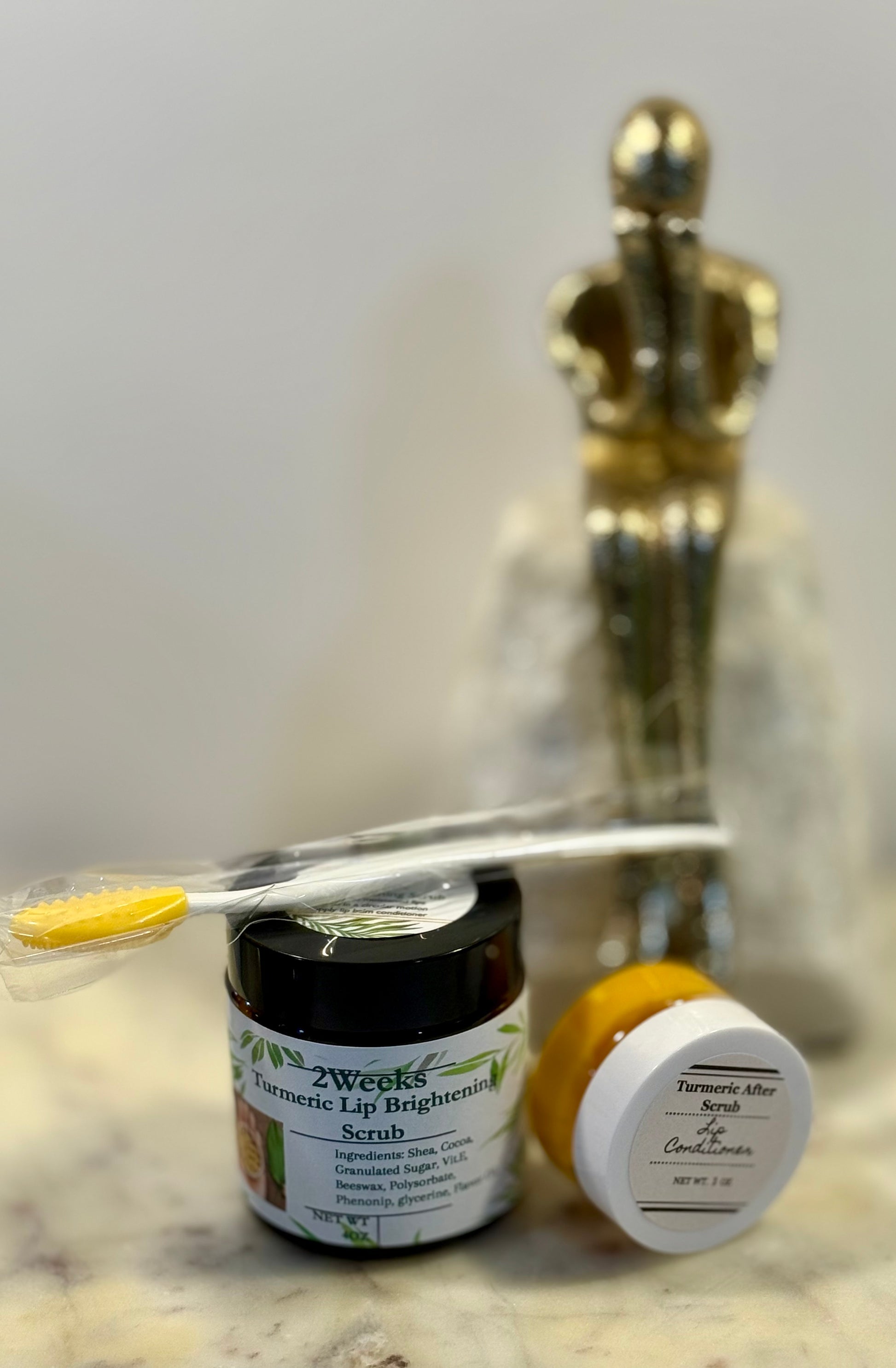 Turmeric lip scrub system